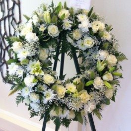 RESTING WITH THE ANGELS (Funeral Wreath) - Roses, Casablanca Lilies, Chrysanthemums, White Million Stars . . . select size