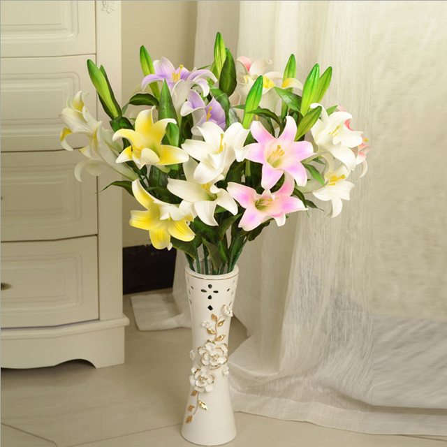 Centerpiece 103 - Dazzling St. Joseph Lilies . . . more