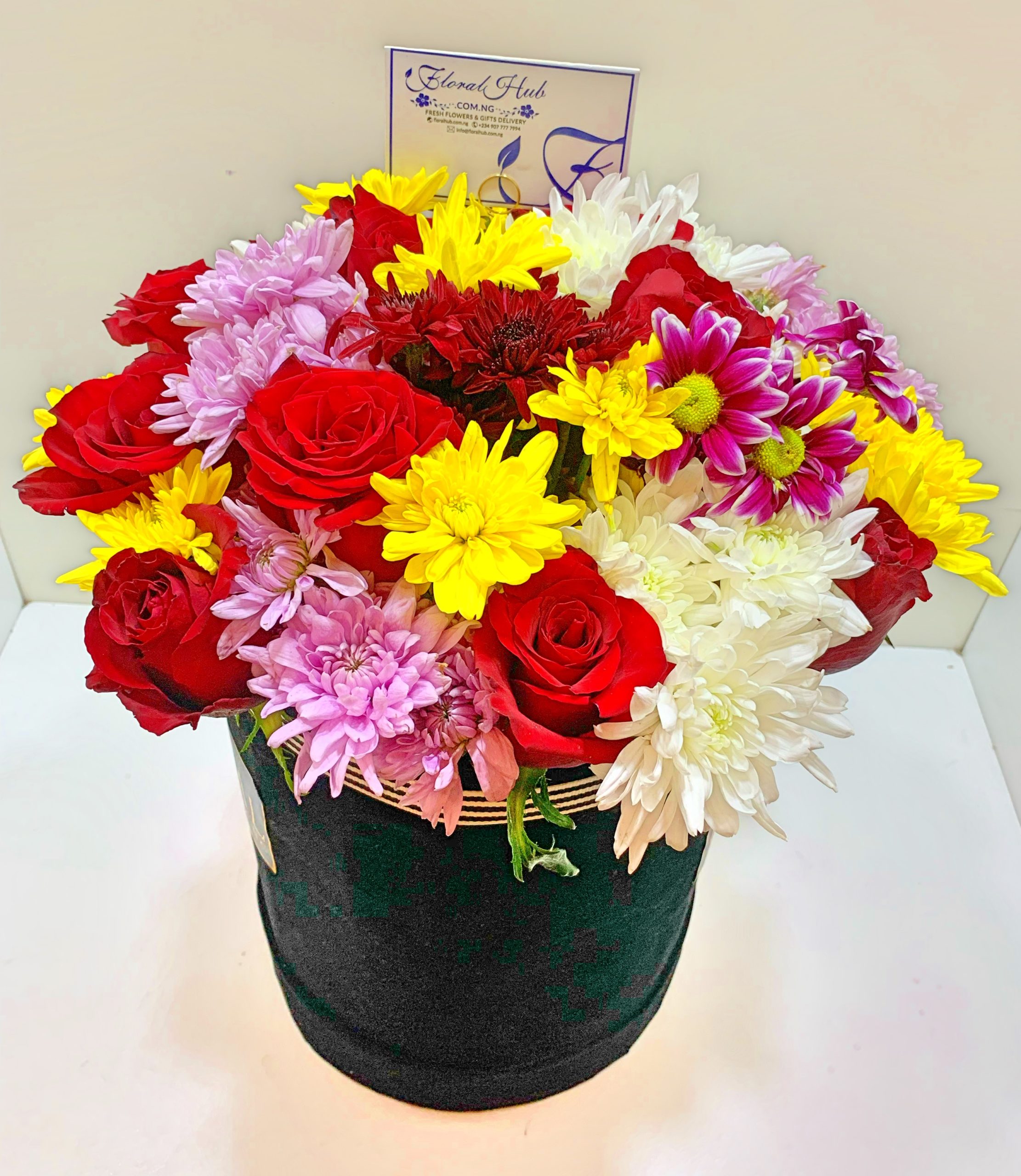 Dune Box Arrangement- Box of roses with mixed chrysanthemums and million stars