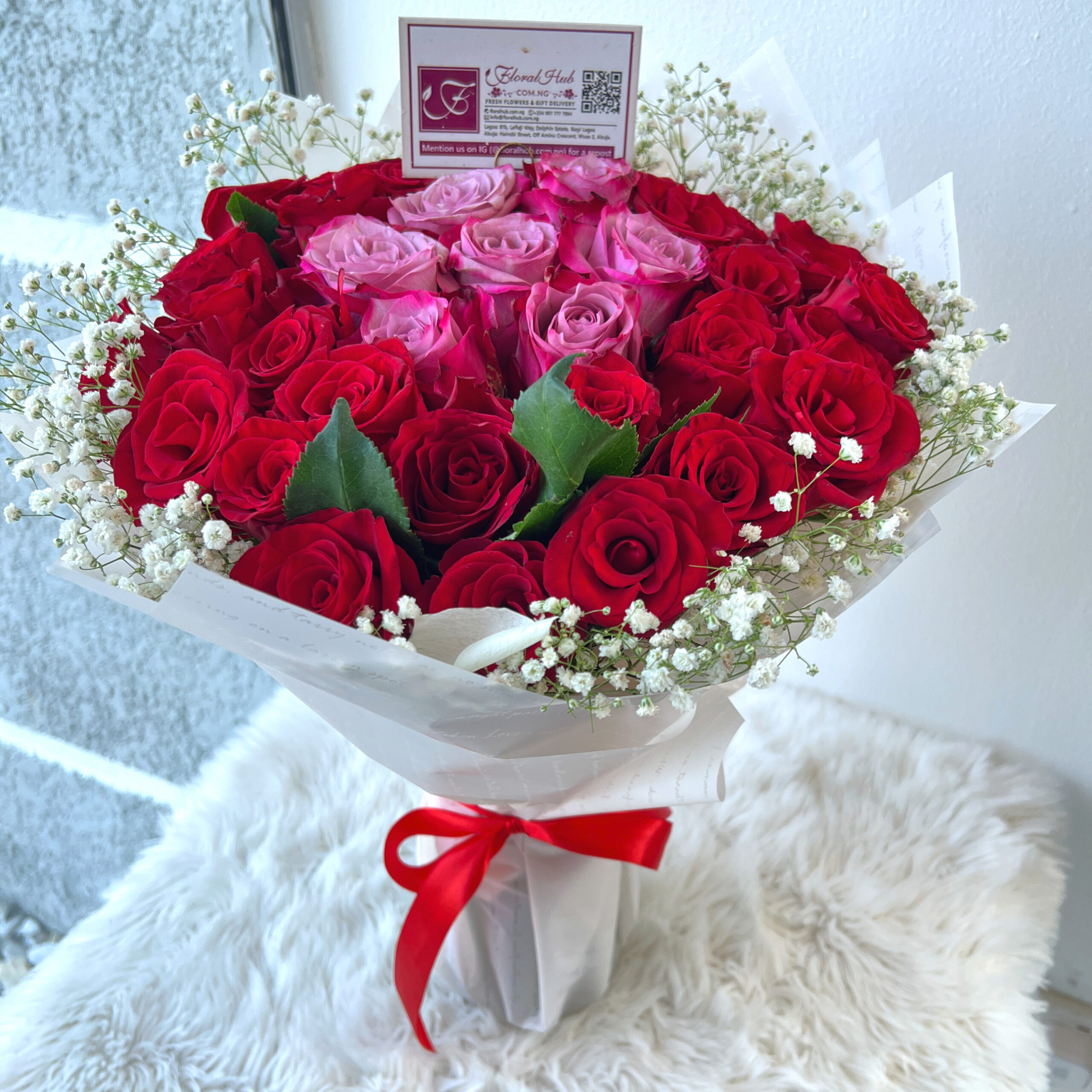 Casablanca Bouquet -  A Bouquet arrangement of Red and Purple roses with million stars