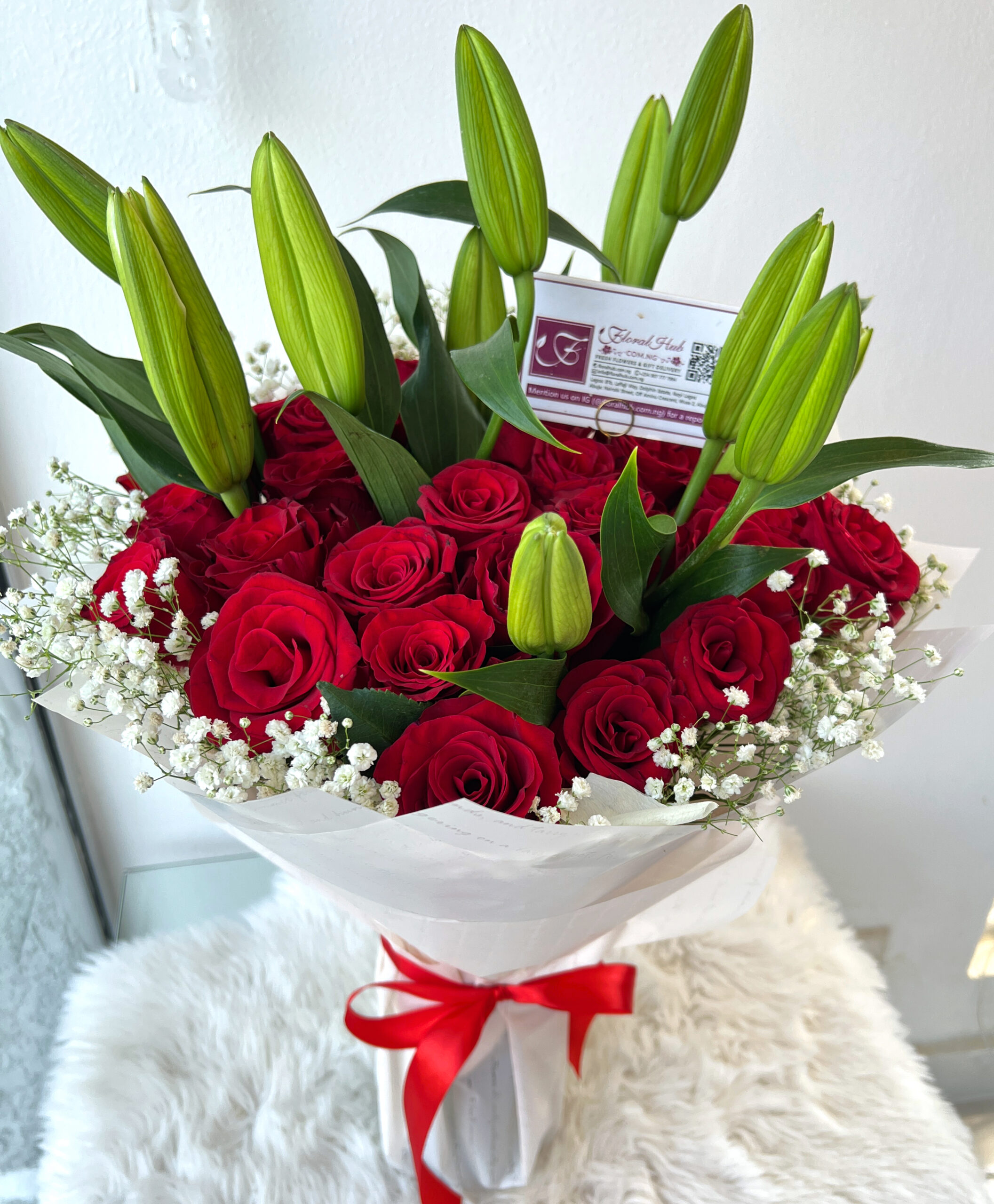 Debonair Bouquet– Bouquet of Lilies with Red Roses, and Gypsophila (million star) or lepidium