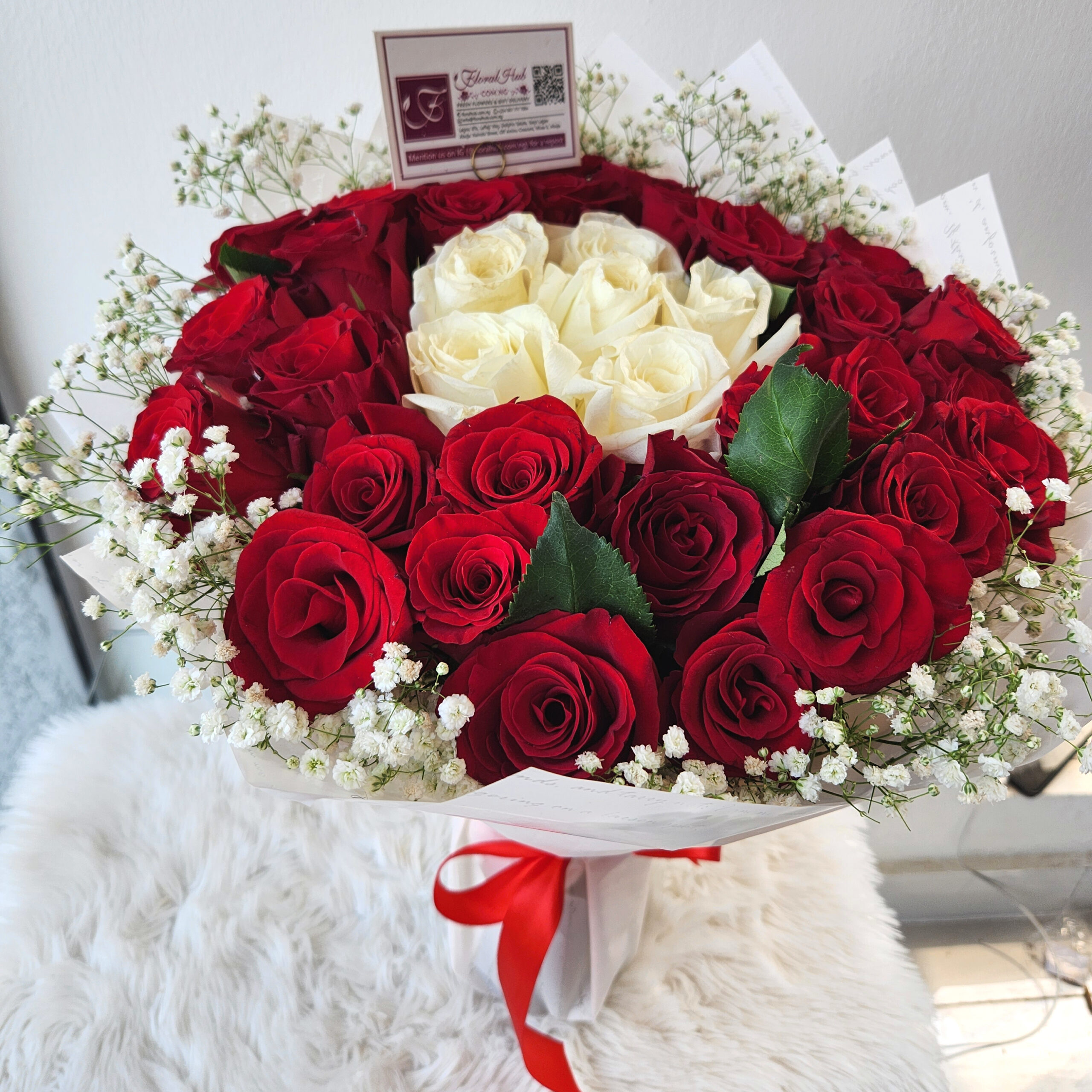 Loxarre Bouquet - A Bouquet of arrangement of red roses and white roses with million stars
