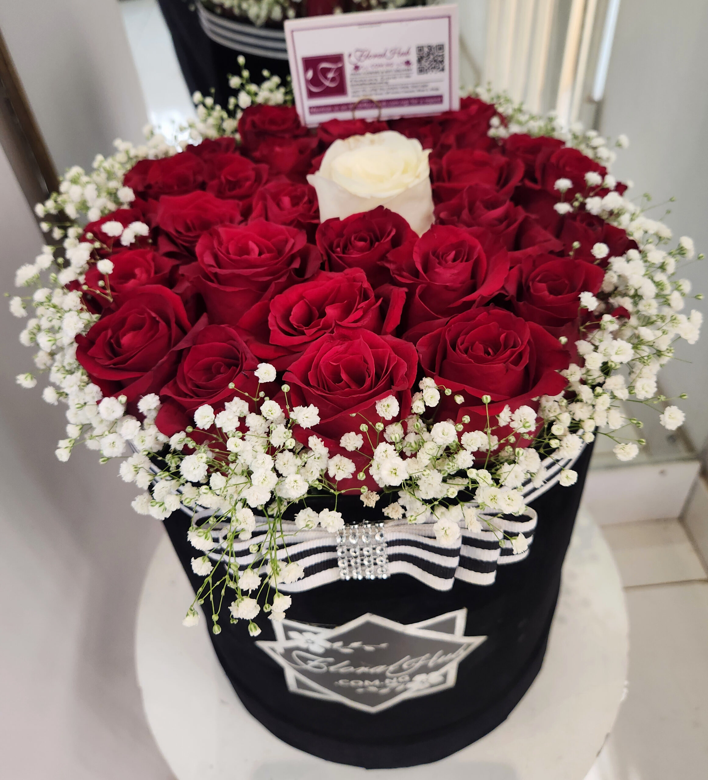 Donatello Box Arrangement-Box of red roses and one contrasting color with million stars