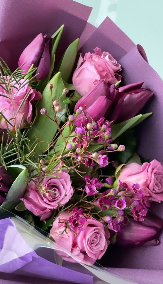 purple roses with fillers